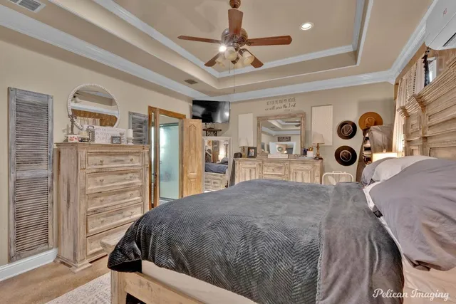 a bed room with a bed and a cabinets