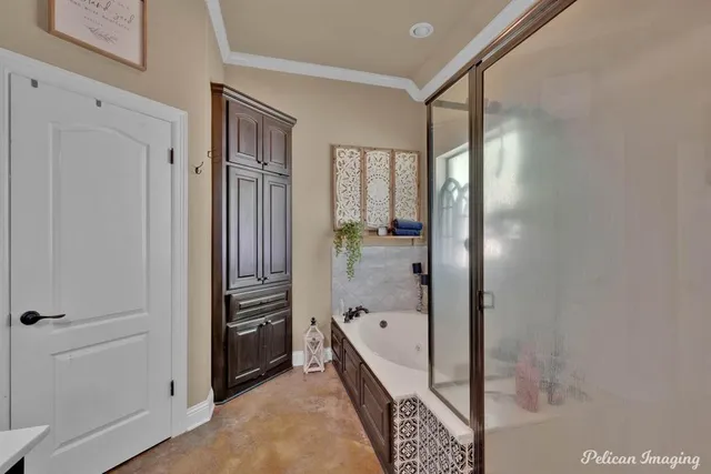 a bathroom with a bathtub and a shower