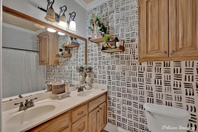 a bathroom with a sink a mirror and shower