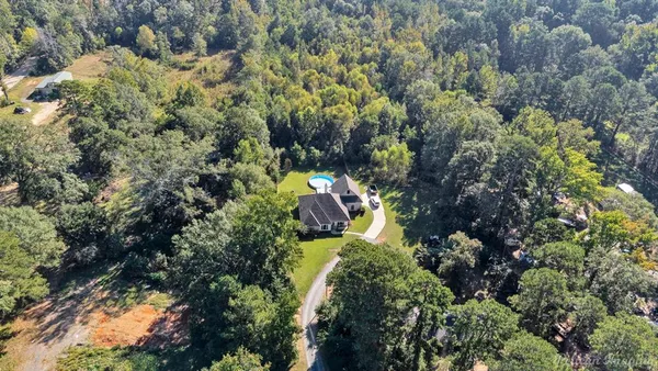 a view of a house with a park