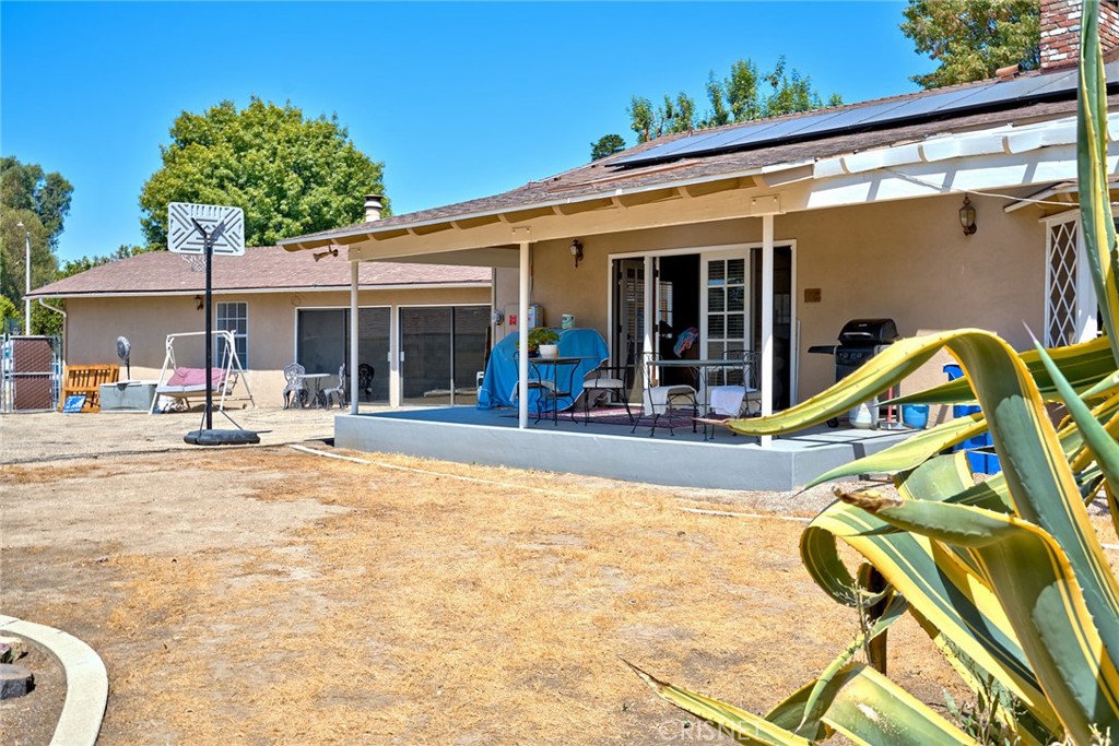 10370 Topeka Drive Porter Ranch, CA 91326 - Photo 27 of 33 a view of a house with a patio