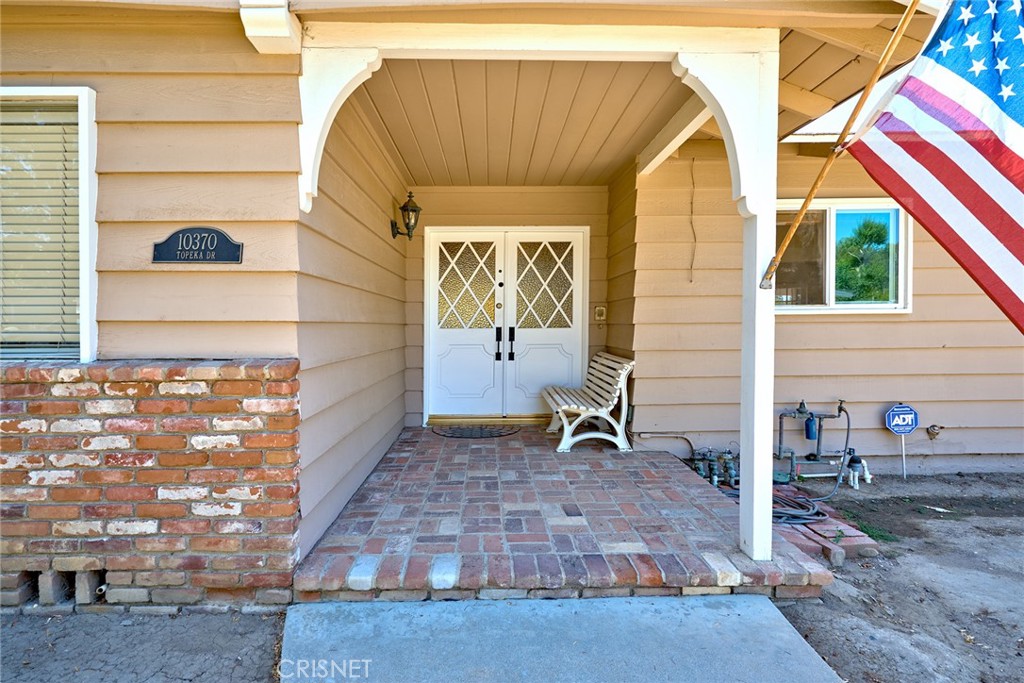 10370 Topeka Drive Porter Ranch, CA 91326 - Photo 29 of 33 a view of house with a outdoor space