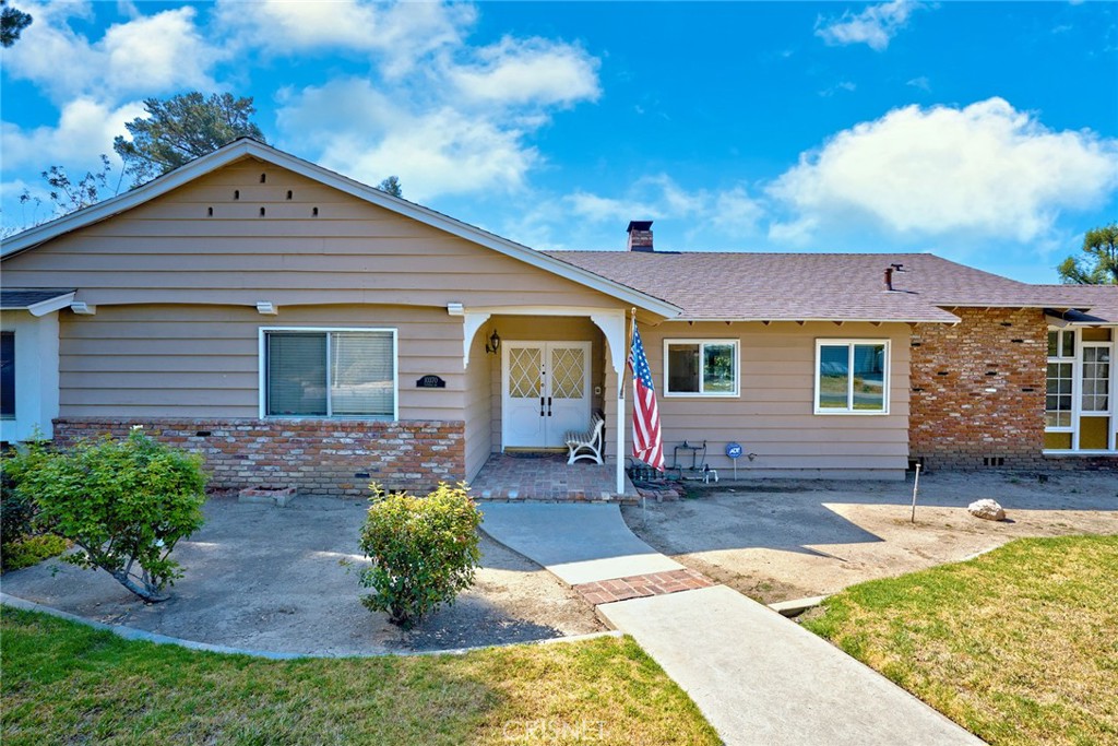 10370 Topeka Drive Porter Ranch, CA 91326 - Photo 33 of 33 a front view of a house with garden