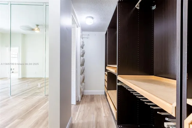 an aerial view of residential houses with outdoor space and street view