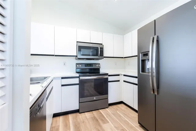 $360,000 | 15865 Southwest 6th Place, Unit 201, Pembroke Pines, FL 33027