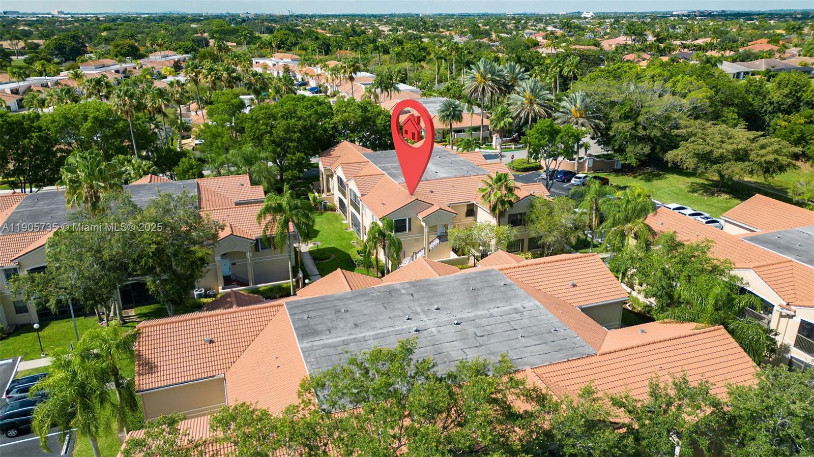 15865 Southwest 6th Place, Unit 201 Pembroke Pines, FL 33027 - Photo 72 of 80 an aerial view of a house with a yard and lake view