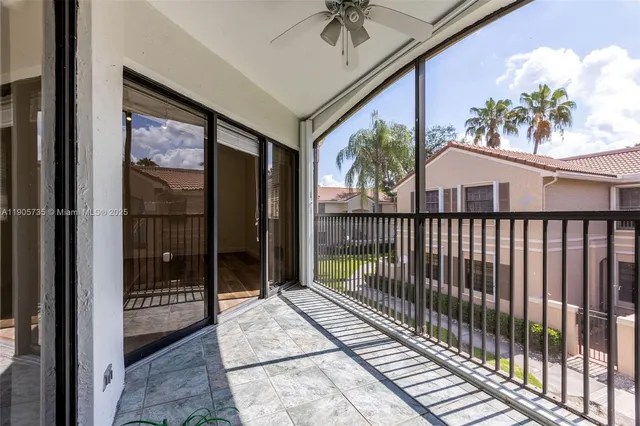 a kitchen with stainless steel appliances a refrigerator stove and microwave