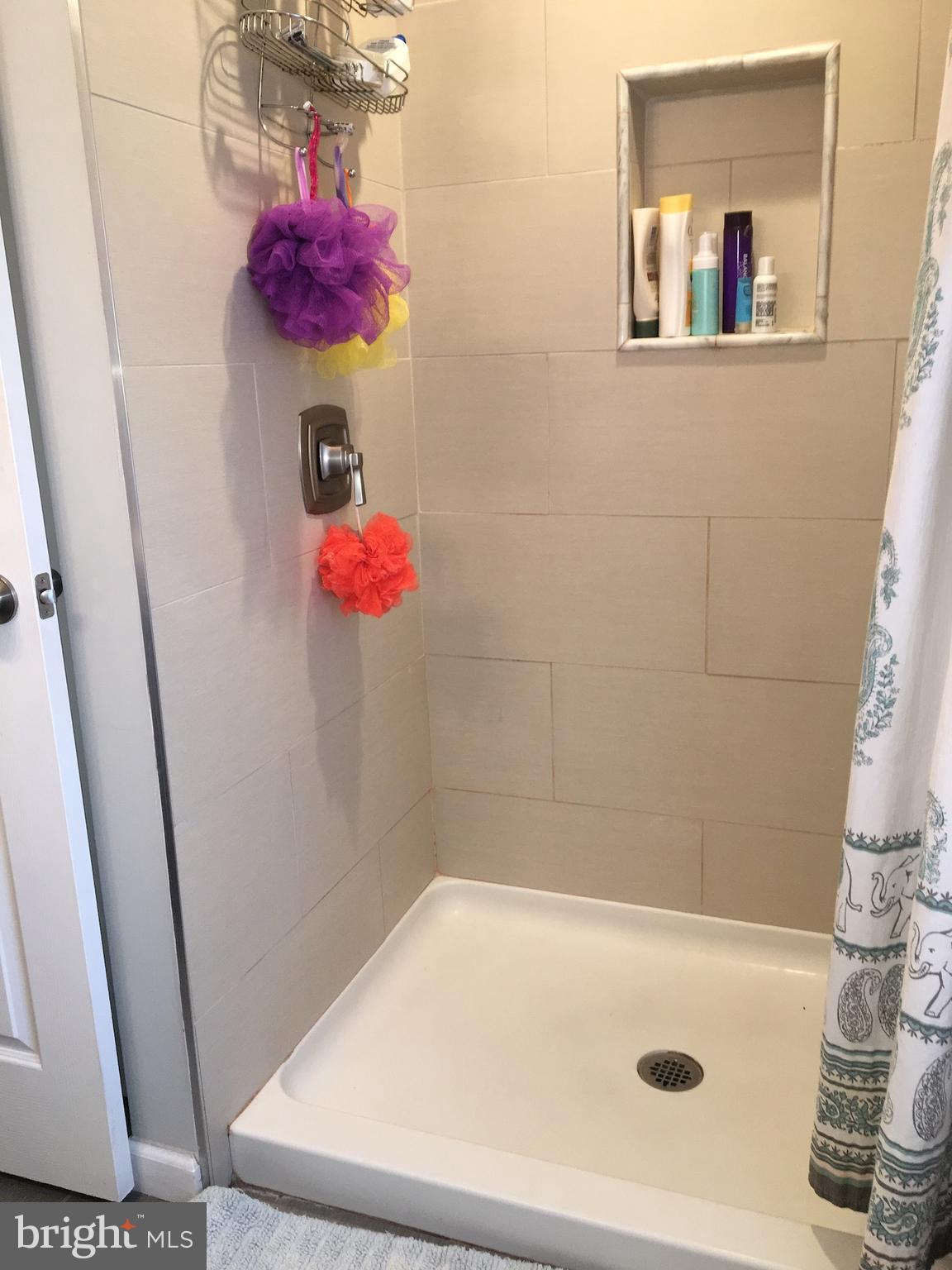 4203 Main Street, Unit 2 Philadelphia, PA 19127 - Photo 12 of 16 a bathroom with a tub