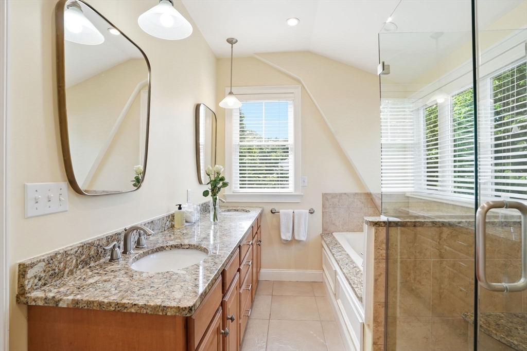 59 Elm Street Hingham, MA 02043 - Photo 20 of 33 a en suite bathroom with a granite countertop sink and a mirror