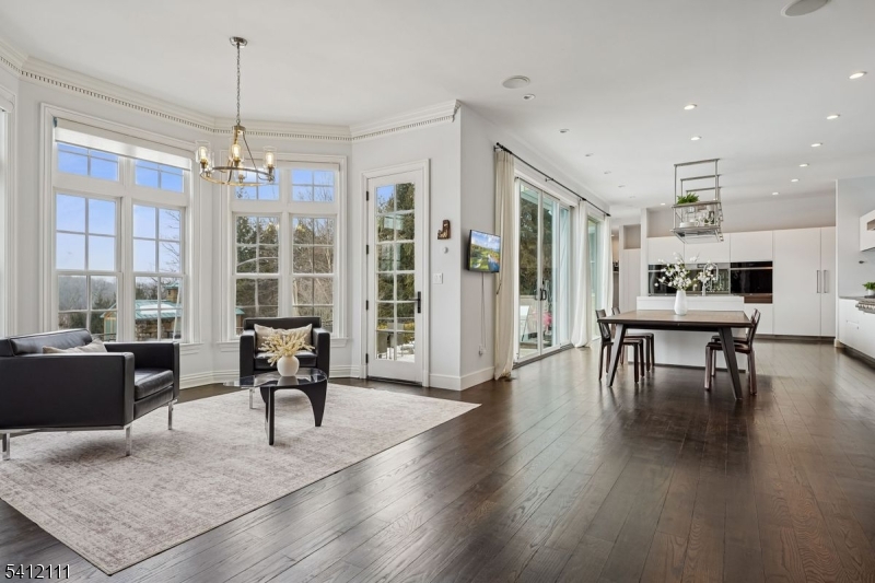 89 Mosle Road Peapack-Gladstone, NJ 07931 - Photo 12 of 45 a living room with furniture and a table