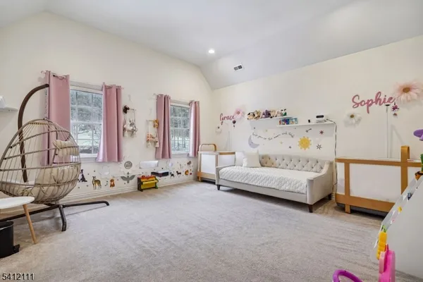 a bedroom with furniture and a couch