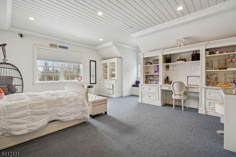 89 Mosle Road Peapack-Gladstone, NJ 07931 - Photo 23 of 45 a bed room with a bed and a large window