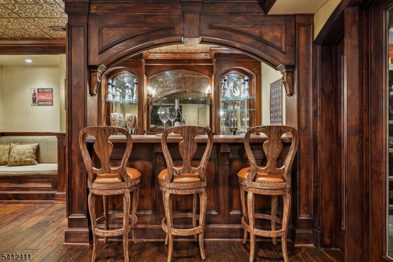 89 Mosle Road Peapack-Gladstone, NJ 07931 - Photo 28 of 45 a view of a dining room with furniture window and wooden floor