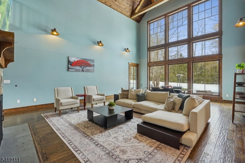 89 Mosle Road Peapack-Gladstone, NJ 07931 - Photo 35 of 45 a living room with furniture and a large window