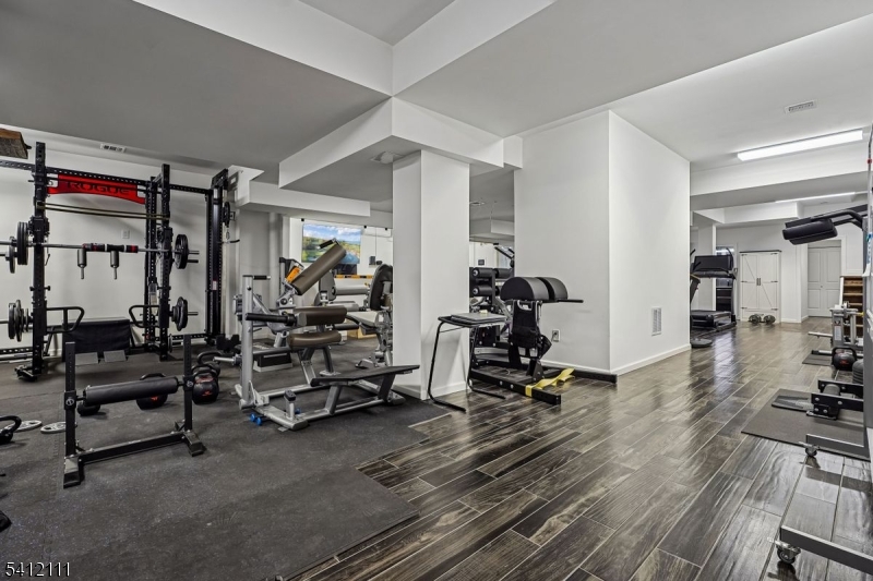 89 Mosle Road Peapack-Gladstone, NJ 07931 - Photo 47 of 50 a view of a room with gym equipment