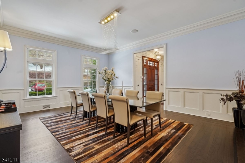 89 Mosle Road Peapack-Gladstone, NJ 07931 - Photo 8 of 45 a view of a dining room with furniture window and wooden floor