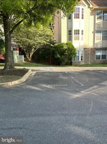 a view of a building with a yard