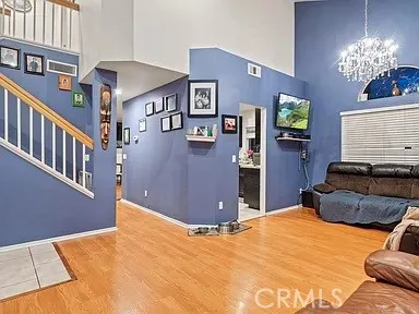 a bedroom with bed and window