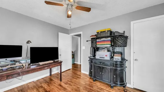 a living room with furniture and flat screen tv