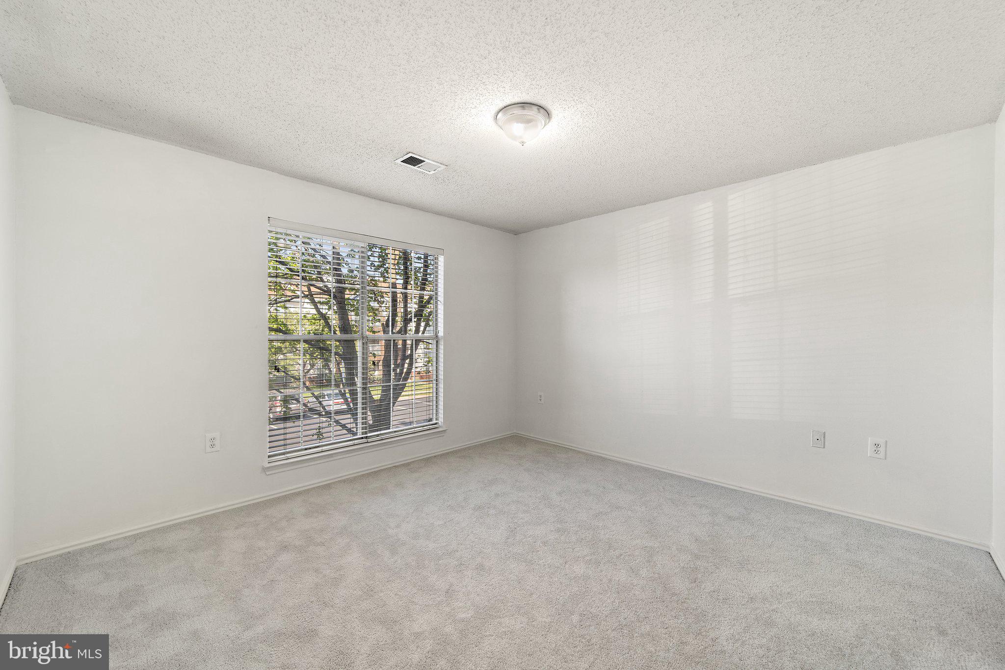 21013 Timber Ridge Terrace, Unit 201 Ashburn, VA 20147 - Photo 18 of 30 Master bedroom