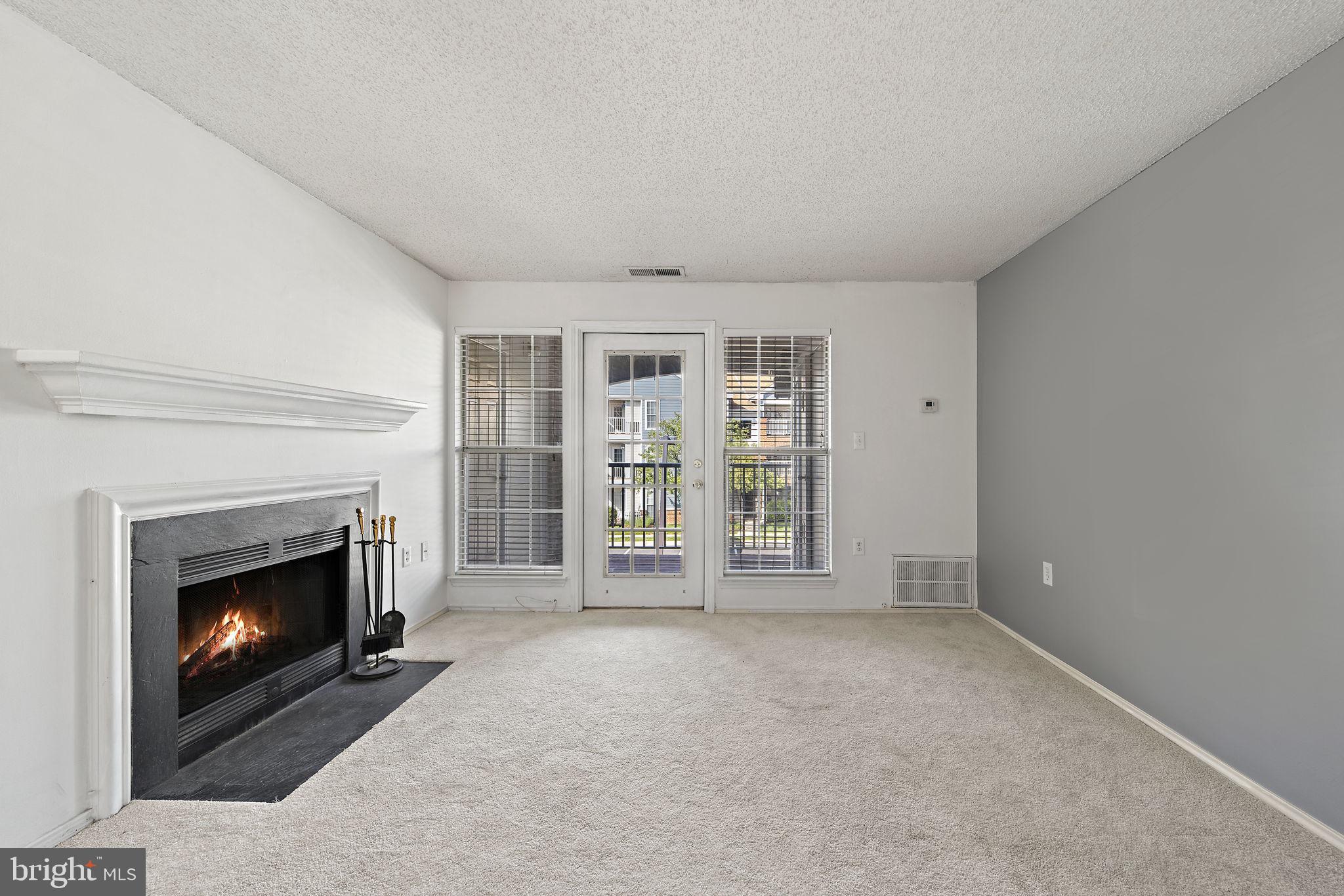 21013 Timber Ridge Terrace, Unit 201 Ashburn, VA 20147 - Photo 10 of 30 Living room