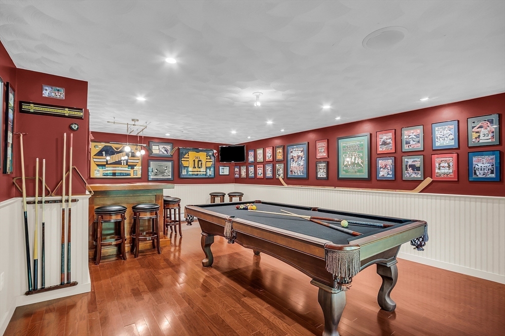 8 Peach Tree Path Andover, MA 01810 - Photo 19 of 41 a living room with furniture pool table and a wooden floor