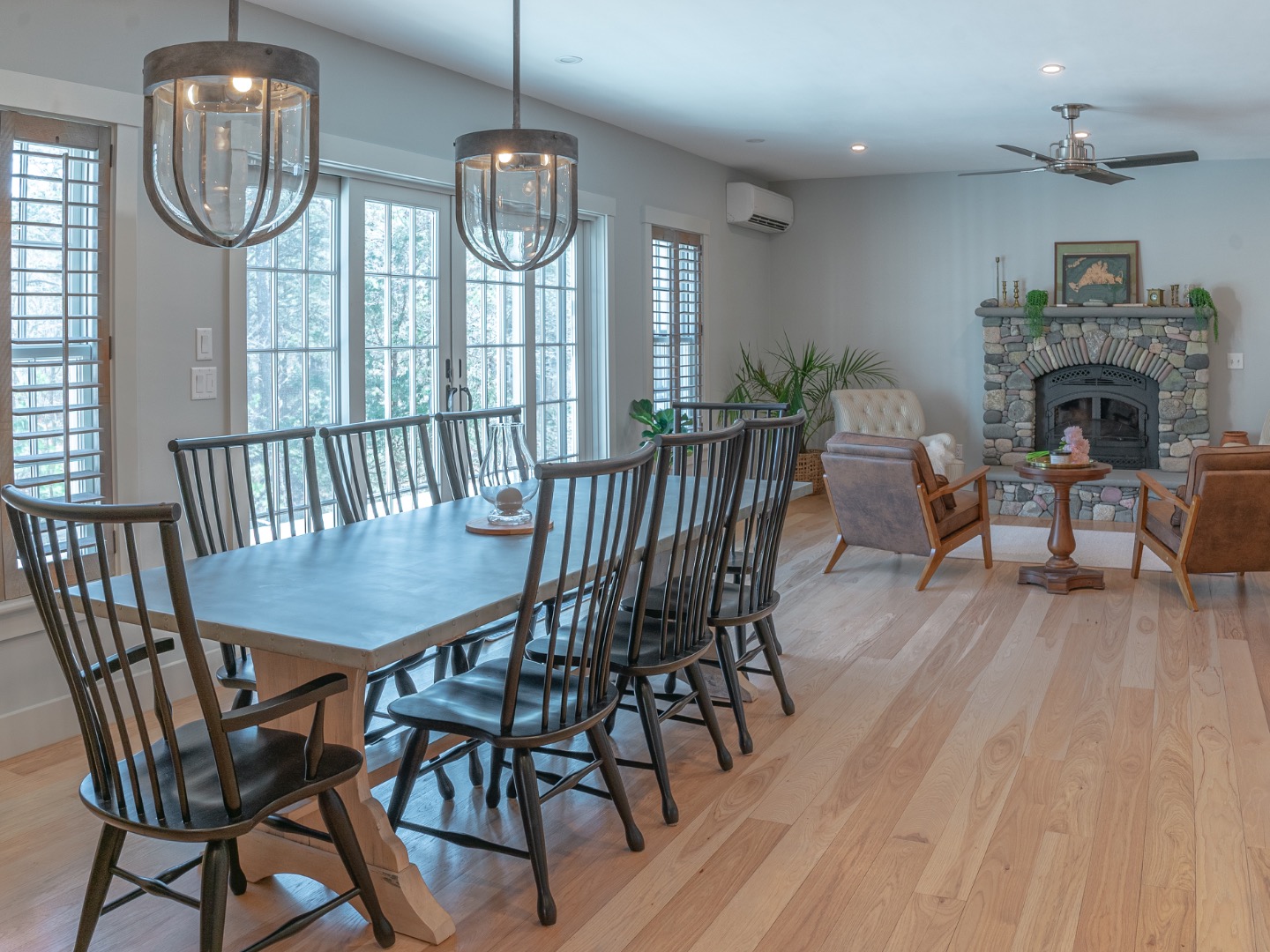 63 Bayes Hill Road Oak Bluffs, MA 02557 - Photo 15 of 60 a view of a dining room with furniture wooden floor and chandelier