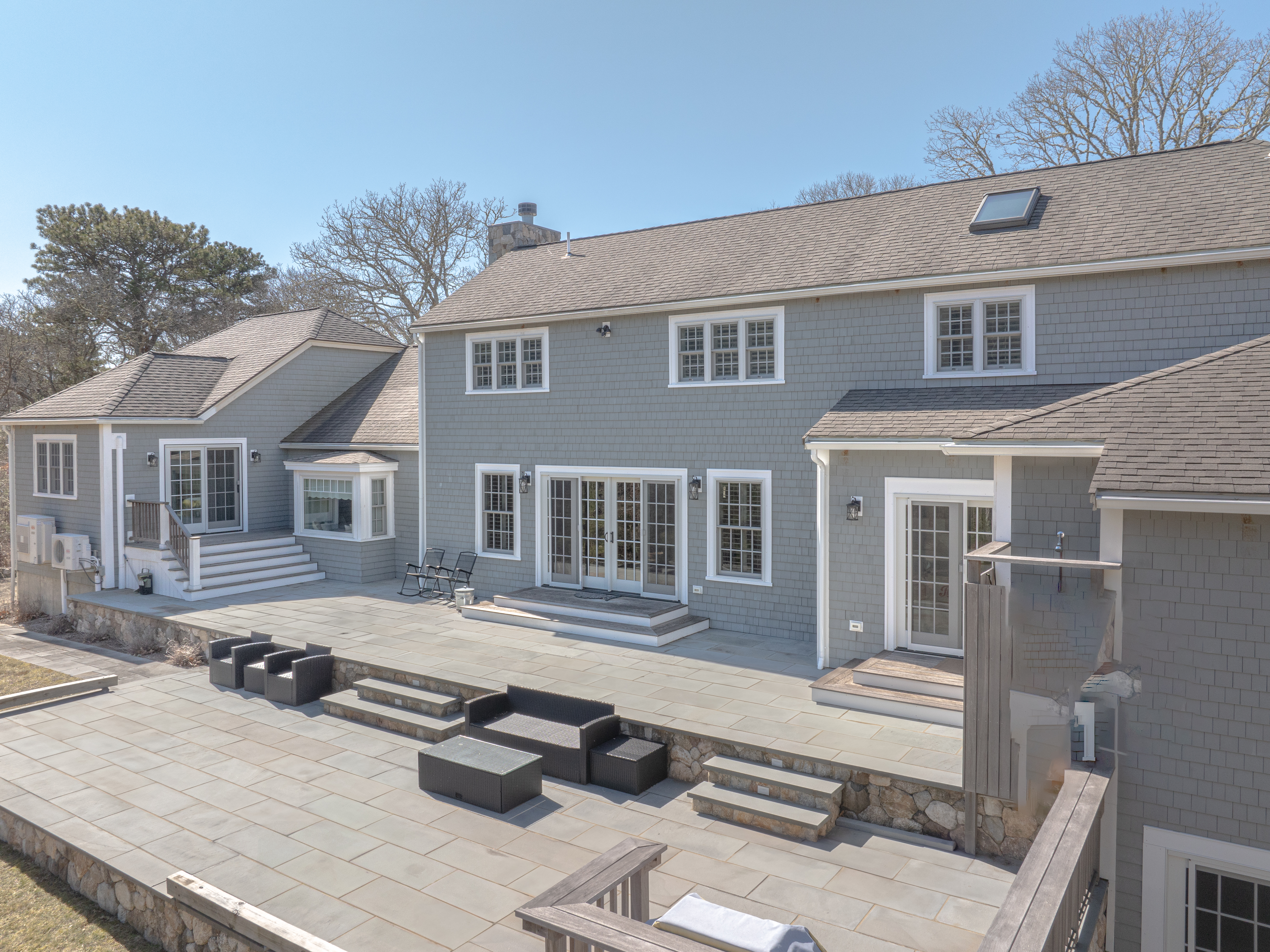 63 Bayes Hill Road Oak Bluffs, MA 02557 - Photo 6 of 60 a front view of a house with windows and yard