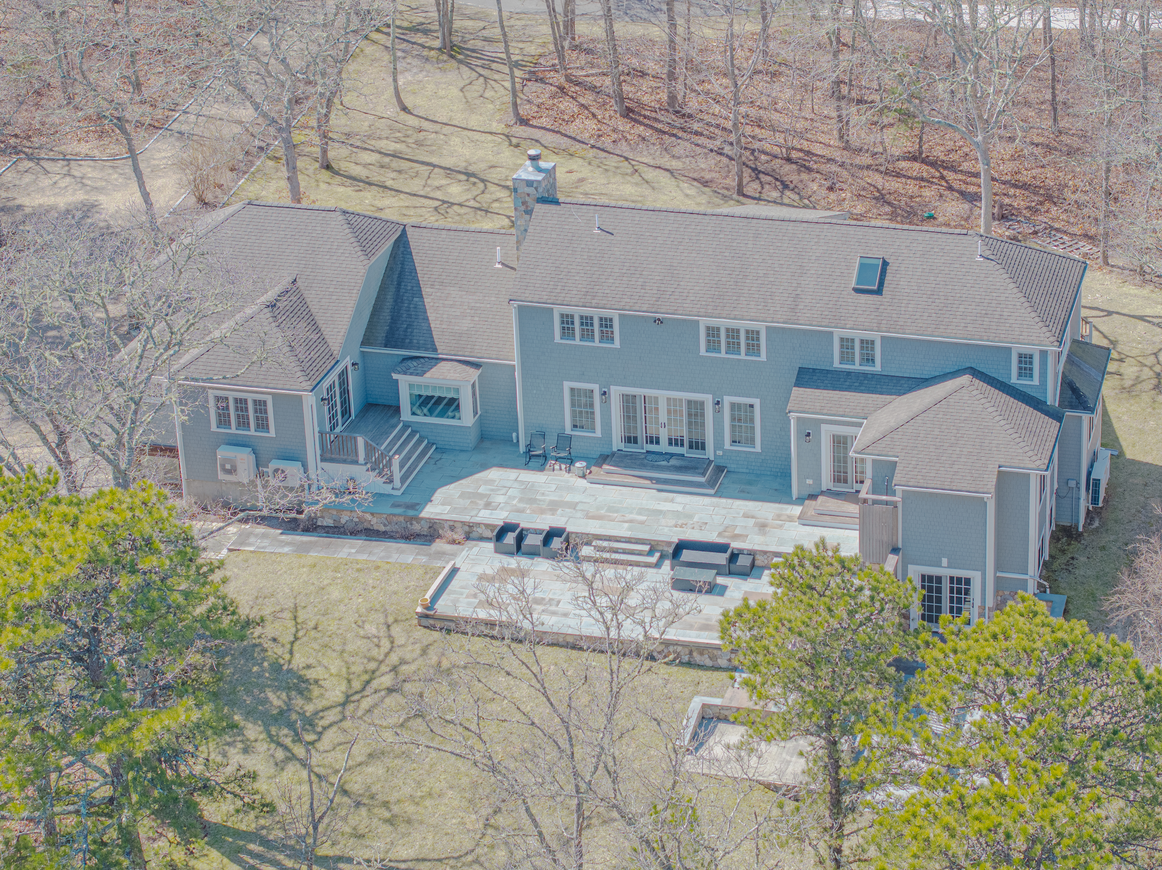 63 Bayes Hill Road Oak Bluffs, MA 02557 - Photo 7 of 60 front view of a house with a yard