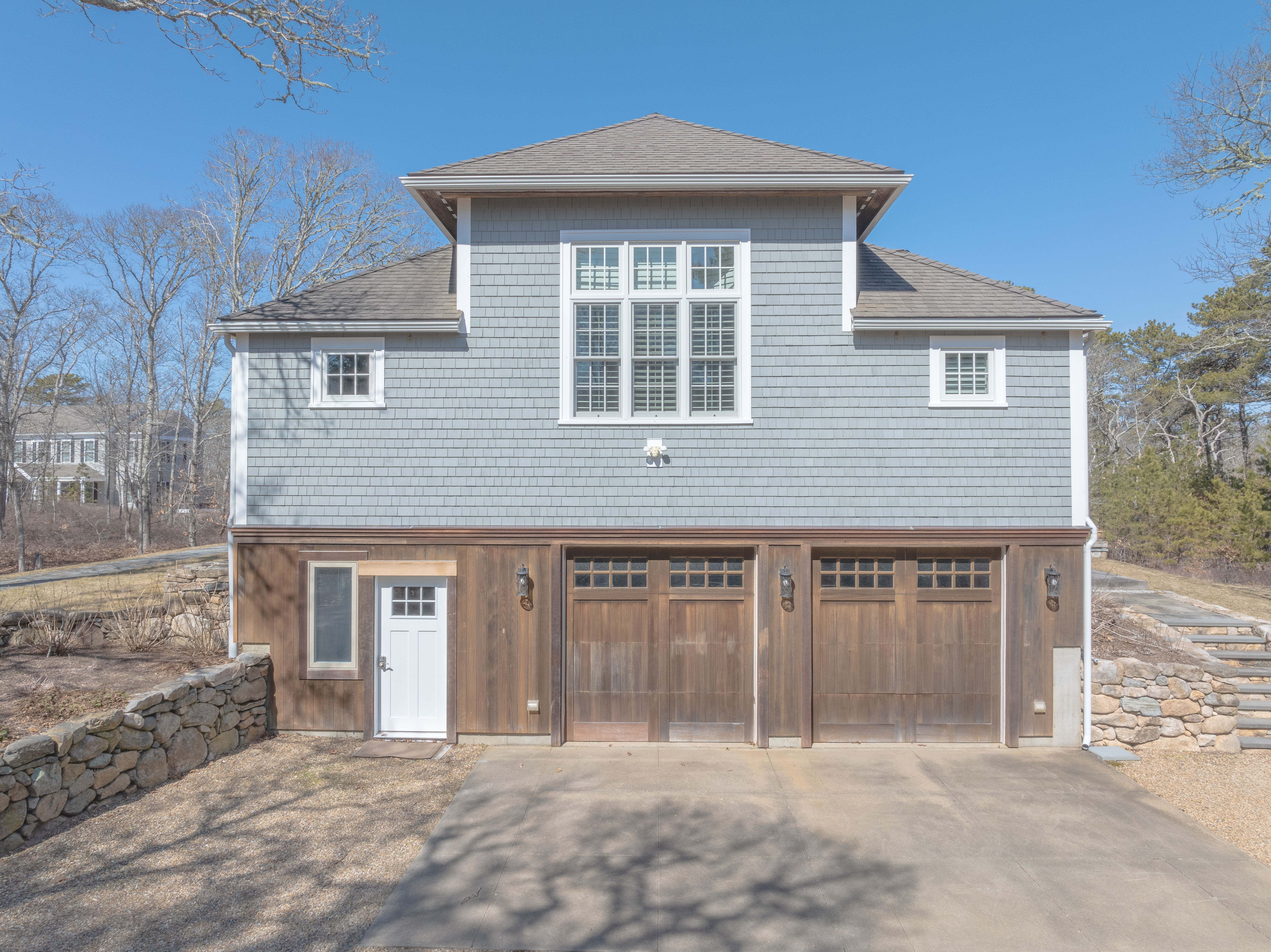 63 Bayes Hill Road Oak Bluffs, MA 02557 - Photo 9 of 60 a front view of a house with a garden