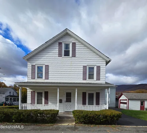 a view of a house with a porch