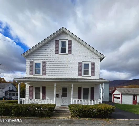 a view of a house with a porch