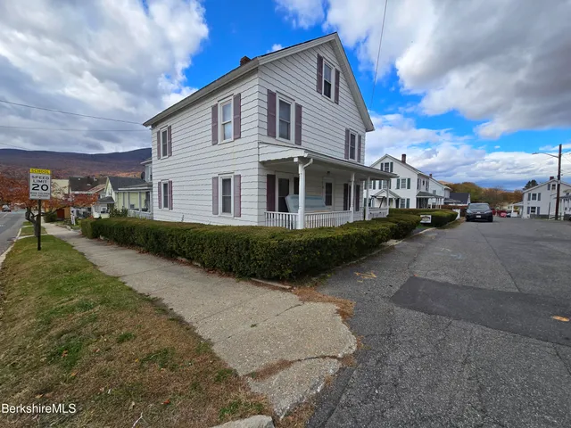 a kitchen with stainless steel appliances a sink and a stove