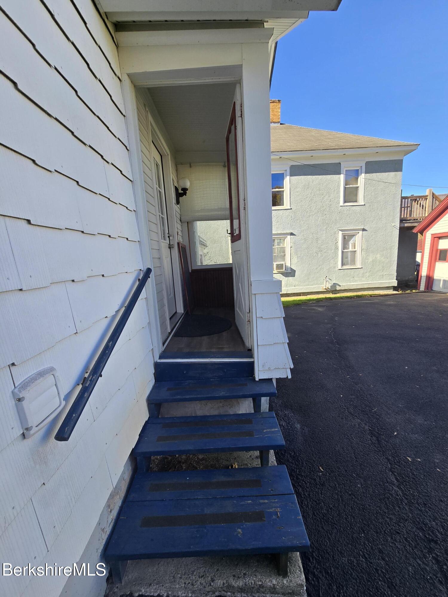 1 Godek Street Adams, MA 01220 - Photo 9 of 51 a view of entryway and hall with wooden floor