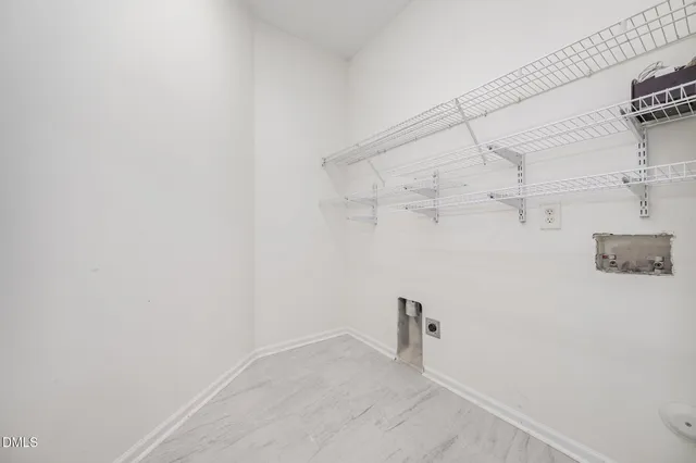 a view of a room with racks on the wall