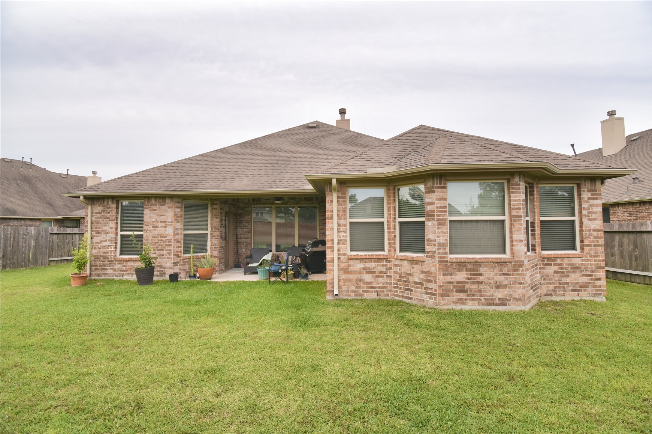 5607 South Denham Ridge Lane Spring, TX 77389 - Photo 37 of 39 a front view of a house with a yard