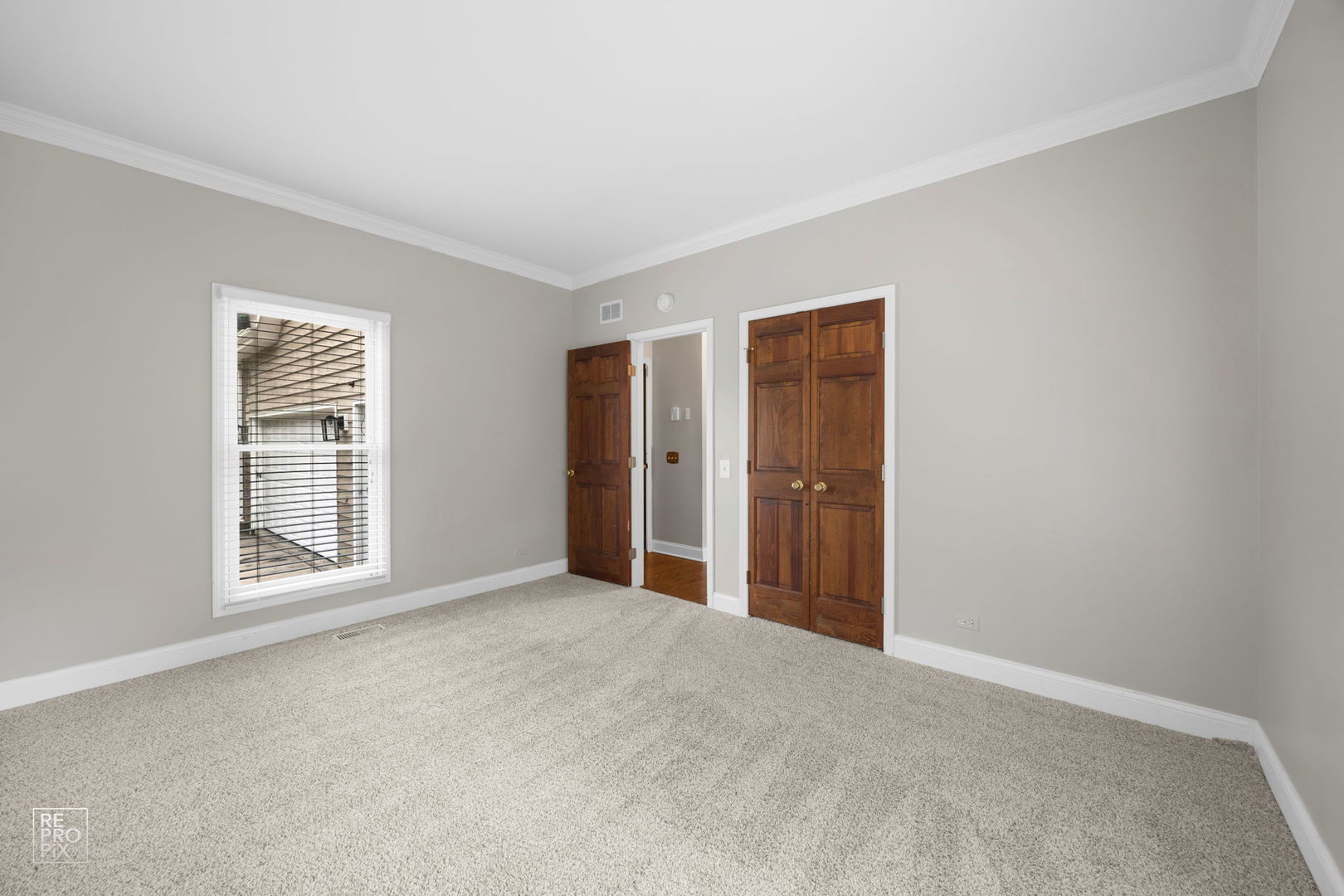 602 Bailey Drive Batavia, IL 60510 - Photo 17 of 26 a view of an empty room with window and closet area