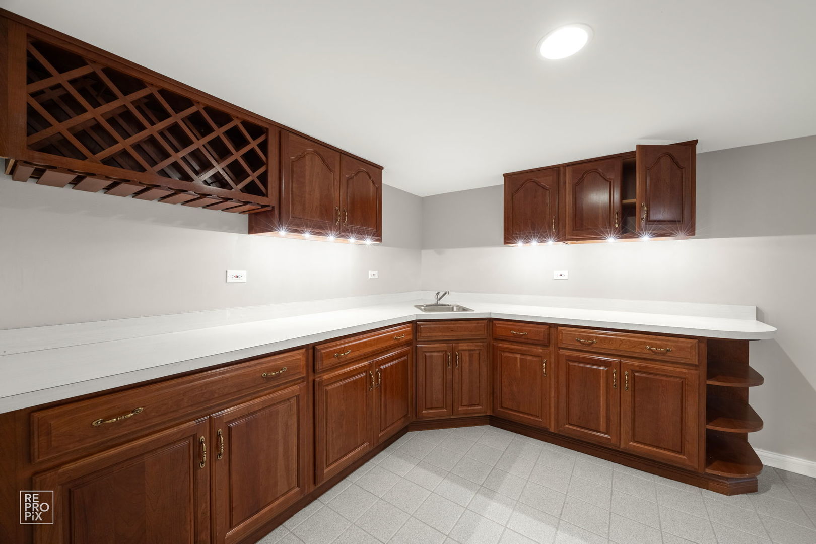602 Bailey Drive Batavia, IL 60510 - Photo 23 of 26 a kitchen with a sink and cabinets