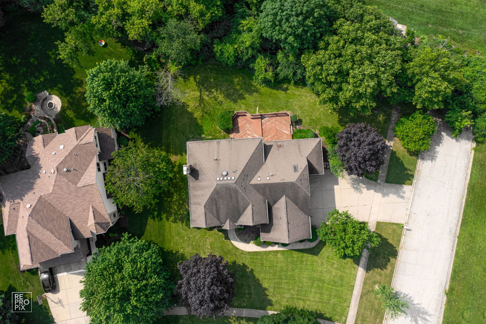 602 Bailey Drive Batavia, IL 60510 - Photo 26 of 26 an aerial view of a house with a yard and trees
