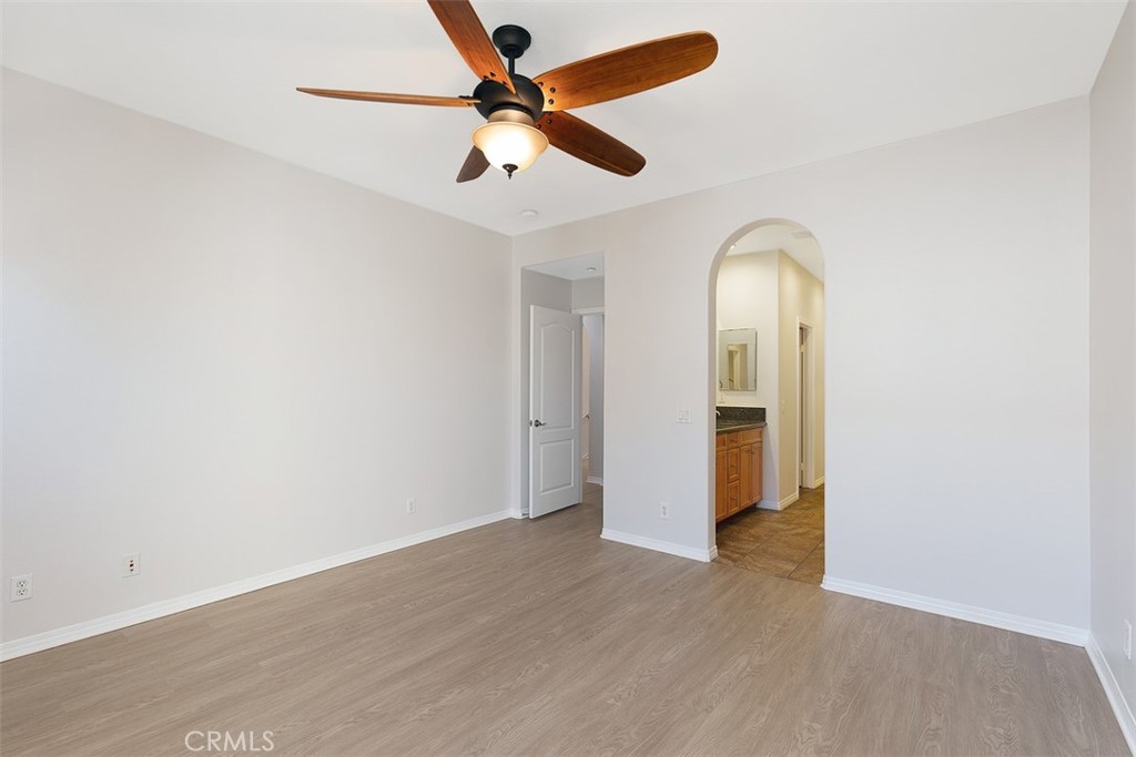 96 Talisman, Unit 23 Irvine, CA 92620 - Photo 19 of 43 wooden floor in an empty room