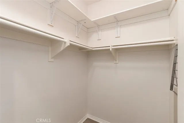 a view of an empty walk in closet