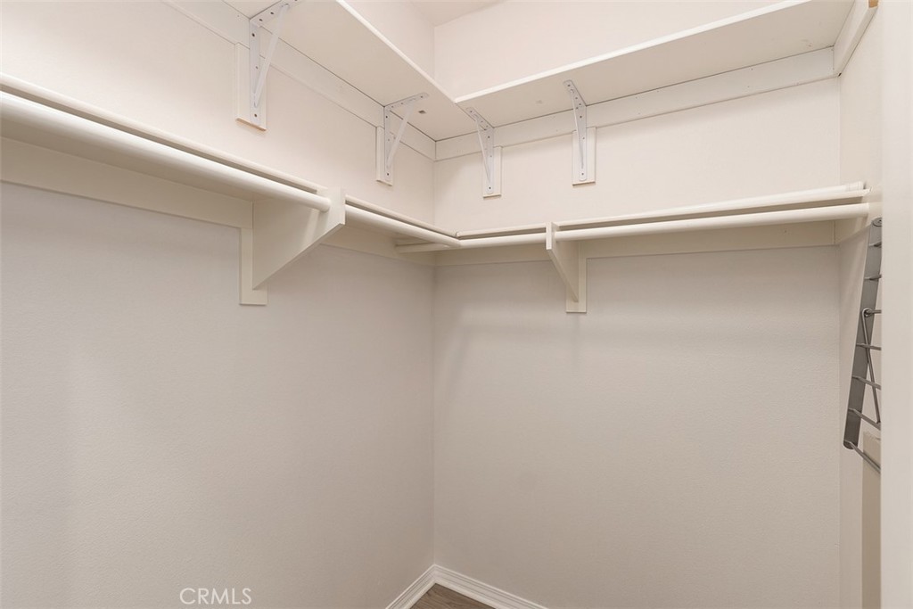 96 Talisman, Unit 23 Irvine, CA 92620 - Photo 21 of 43 a view of an empty walk in closet