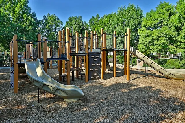 a view of a chairs in a backyard