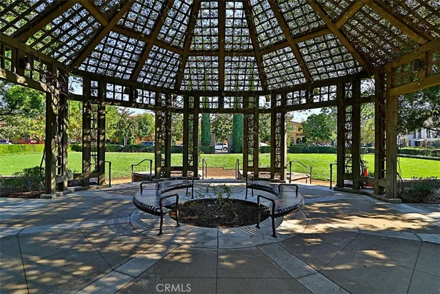 a view of a patio with swimming pool table and chairs