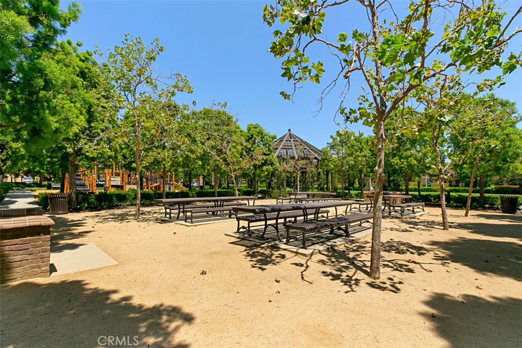 96 Talisman, Unit 23 Irvine, CA 92620 - Photo 34 of 43 a view of a yard with wooden fence