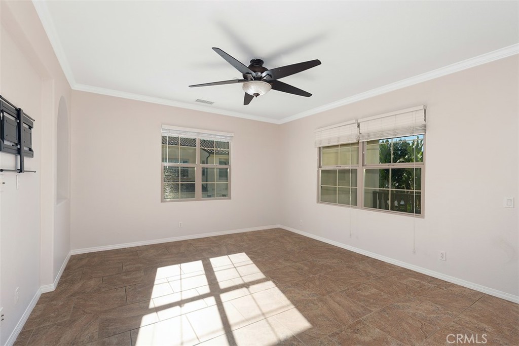 96 Talisman, Unit 23 Irvine, CA 92620 - Photo 6 of 43 a view of an empty room with a window
