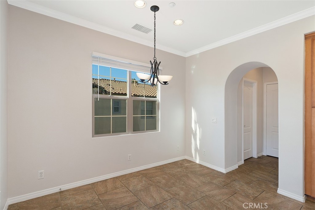 96 Talisman, Unit 23 Irvine, CA 92620 - Photo 10 of 43 a view of an empty room with a window
