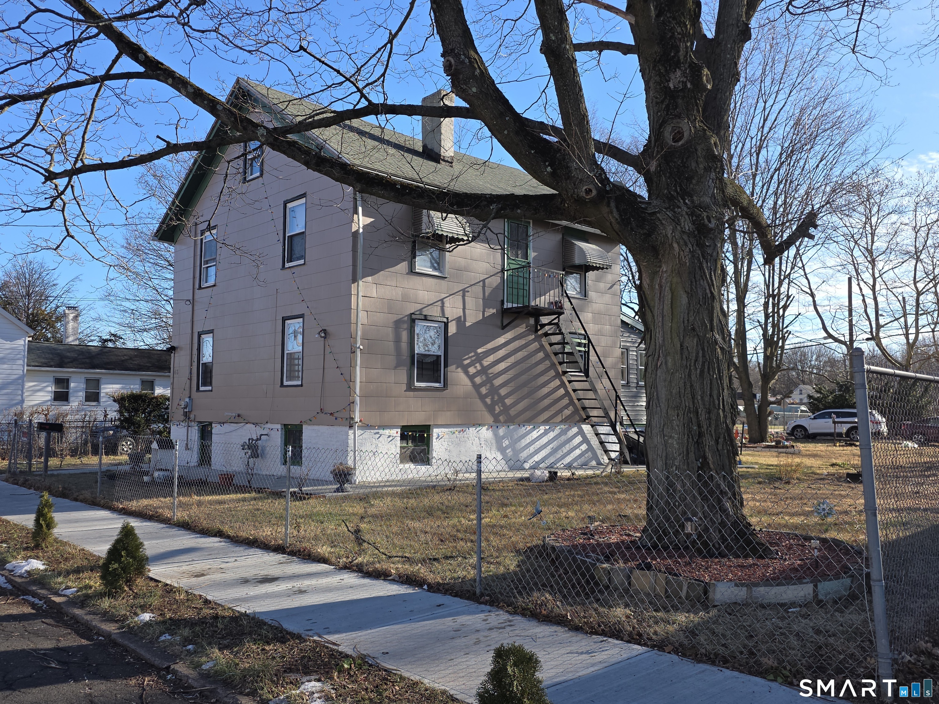 48 Alling Street Hamden, CT 06517 - Photo 2 of 23 a front view of a house with a yard