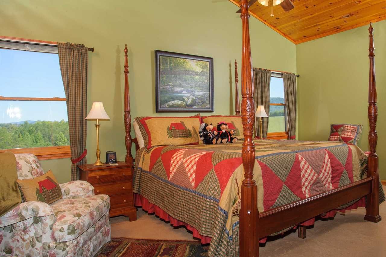 2149 Seaton Springs Road Sevierville, TN 37862 - Photo 14 of 26 a bedroom with a bed window and couch