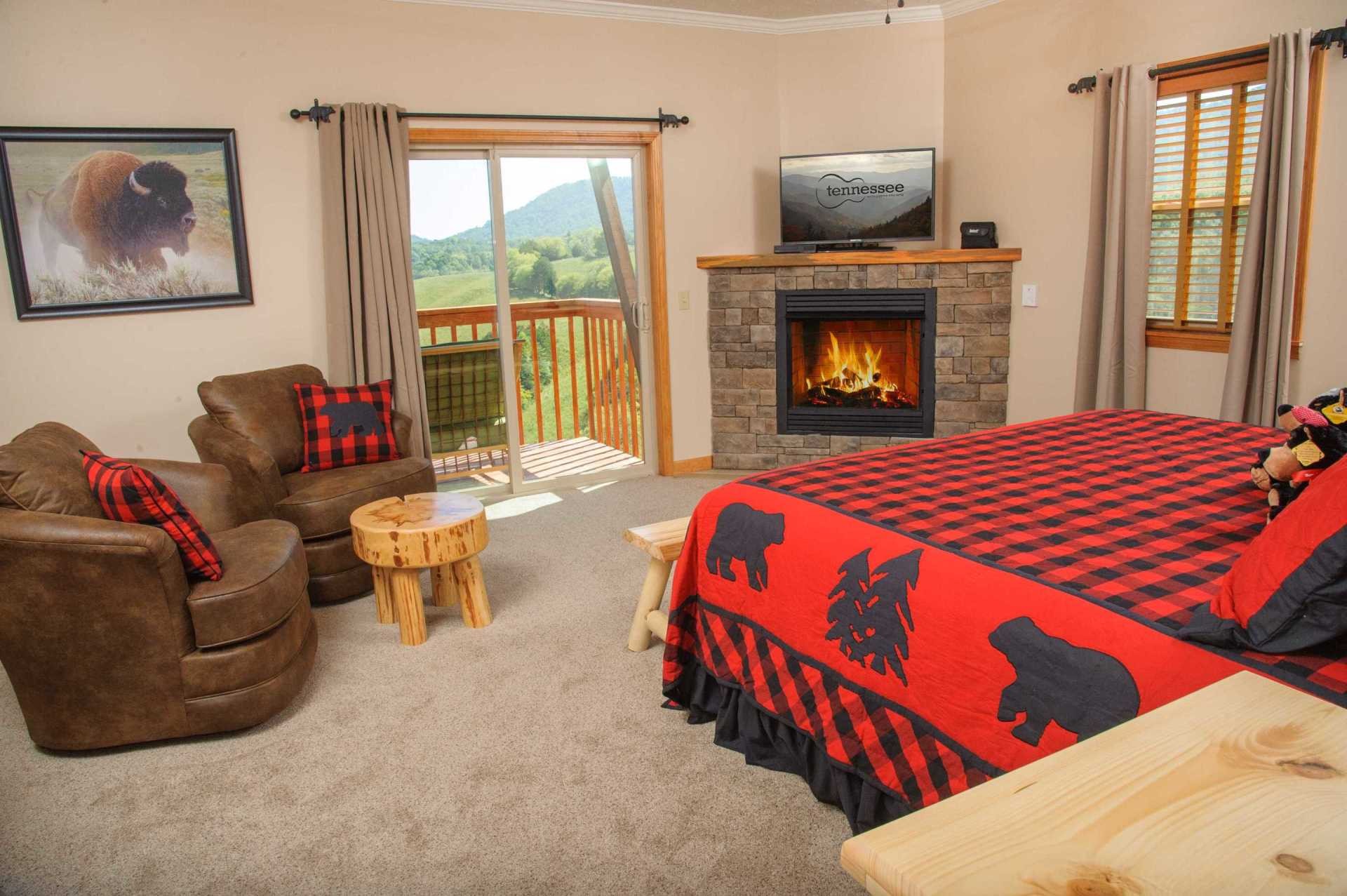 2149 Seaton Springs Road Sevierville, TN 37862 - Photo 18 of 26 a bedroom with a bed and a fireplace